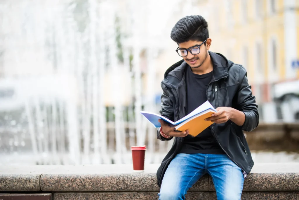 student-studying-with-books-for-ged-support-classes-in-dubai